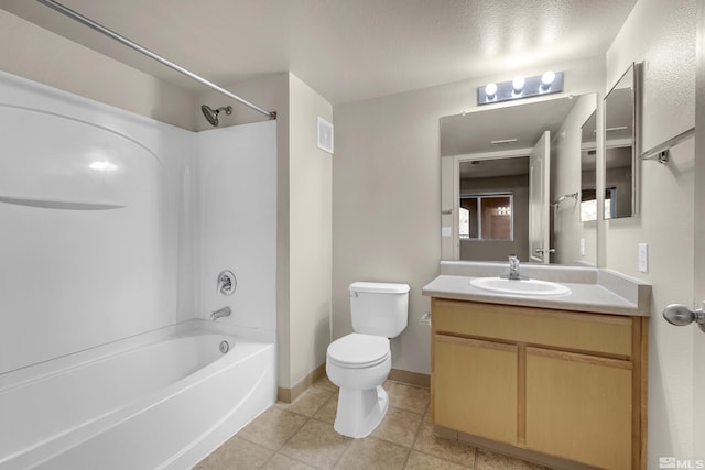 full bathroom featuring vanity, a textured ceiling, shower / bathing tub combination, tile patterned flooring, and toilet