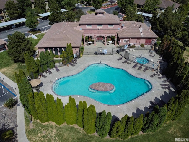 view of swimming pool with a patio