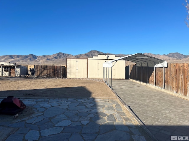 view of patio with a mountain view