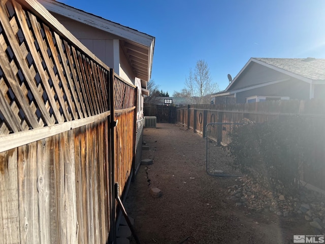 view of side of home featuring central air condition unit