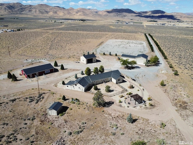 bird's eye view with a mountain view