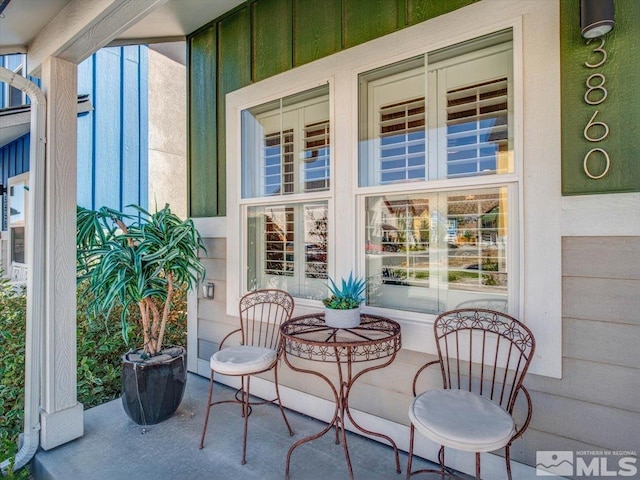 view of patio featuring a porch