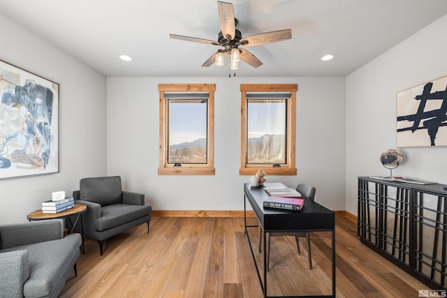 office space featuring ceiling fan and hardwood / wood-style flooring