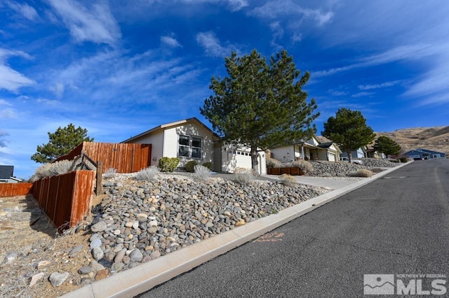 single story home with a garage