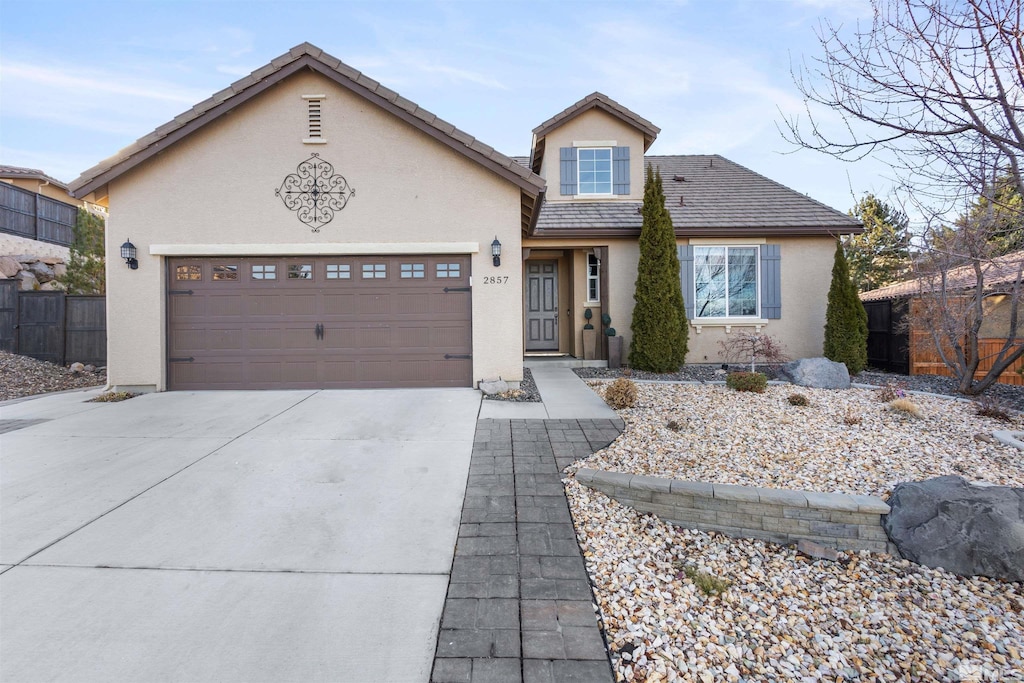 view of front of home featuring a garage