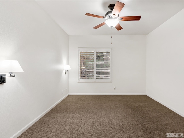 unfurnished room featuring ceiling fan and dark colored carpet