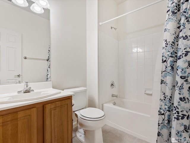 full bathroom featuring shower / bath combo with shower curtain, tile patterned flooring, vanity, and toilet