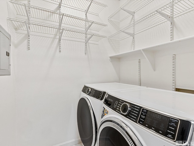 washroom featuring washer and dryer