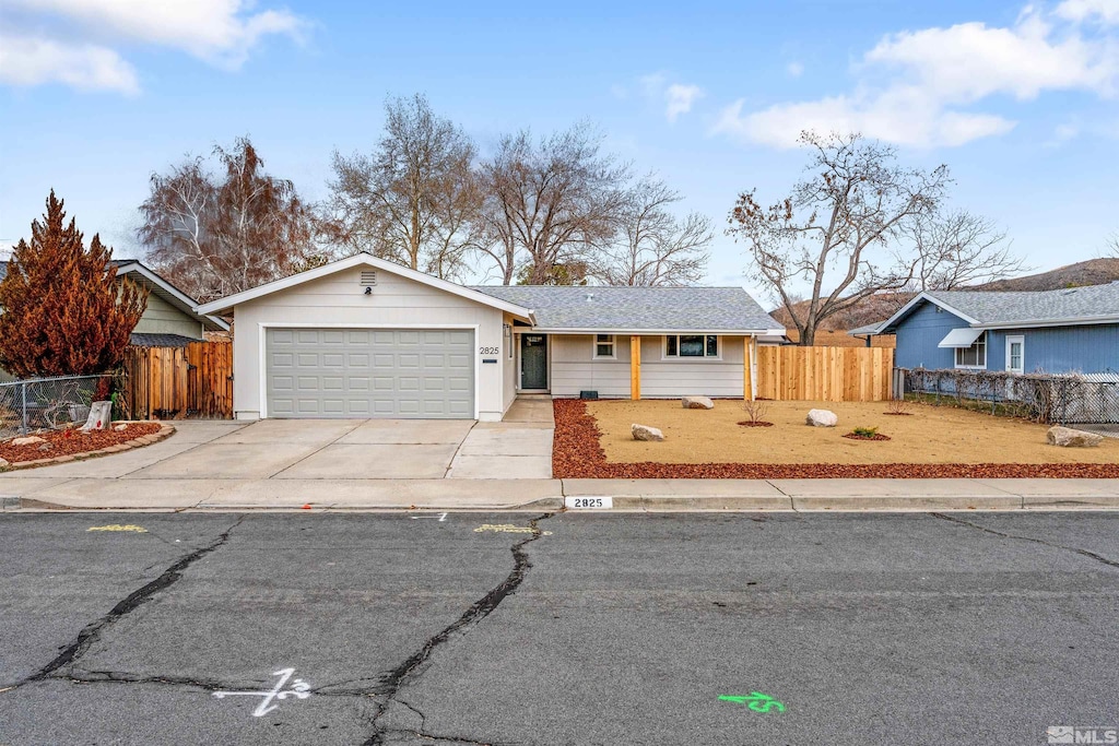 single story home with a garage