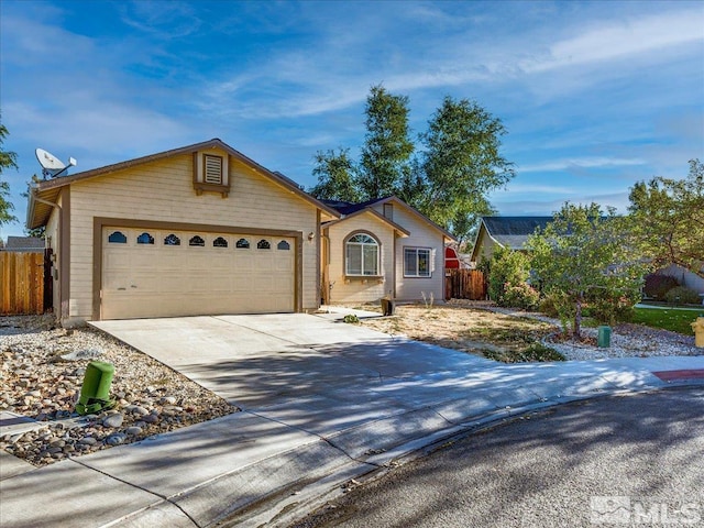 single story home featuring a garage