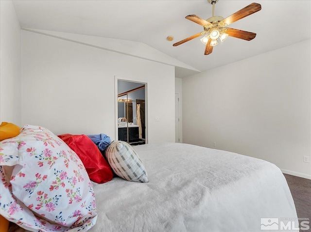 bedroom with ceiling fan, a closet, carpet, and lofted ceiling