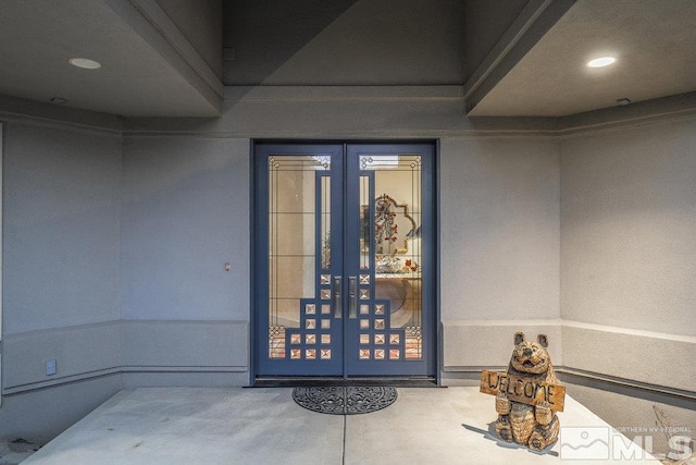 entrance to property featuring french doors