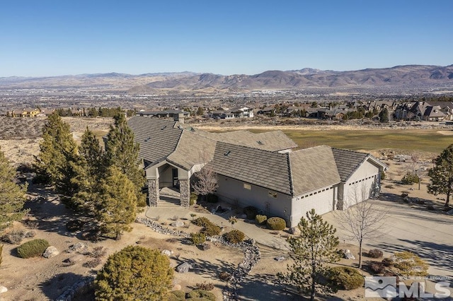 drone / aerial view with a mountain view