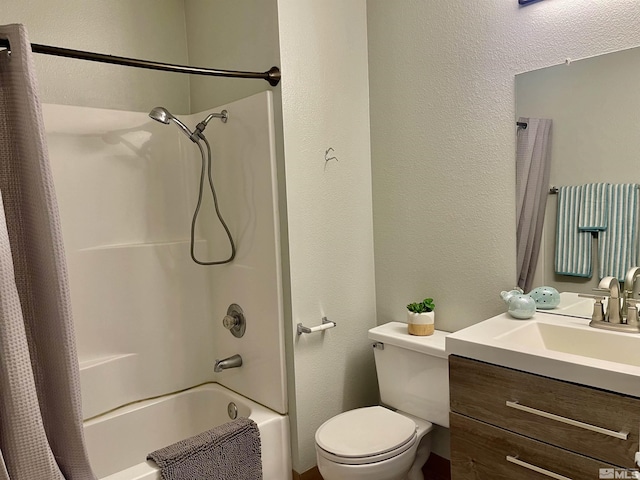 full bathroom with shower / bath combo with shower curtain, vanity, and toilet