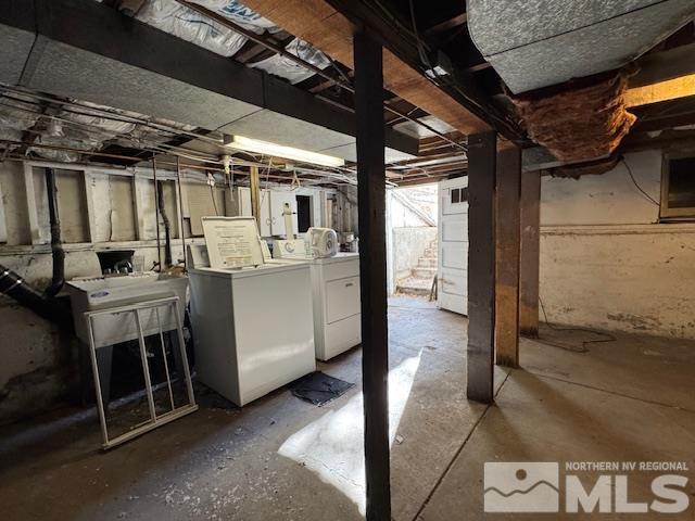 basement featuring washing machine and dryer