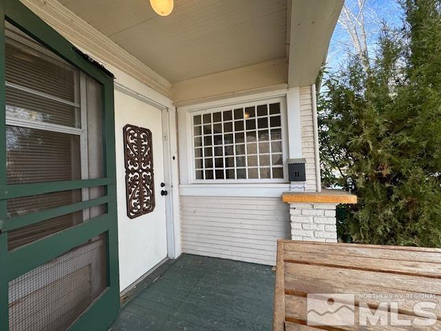 entrance to property with covered porch