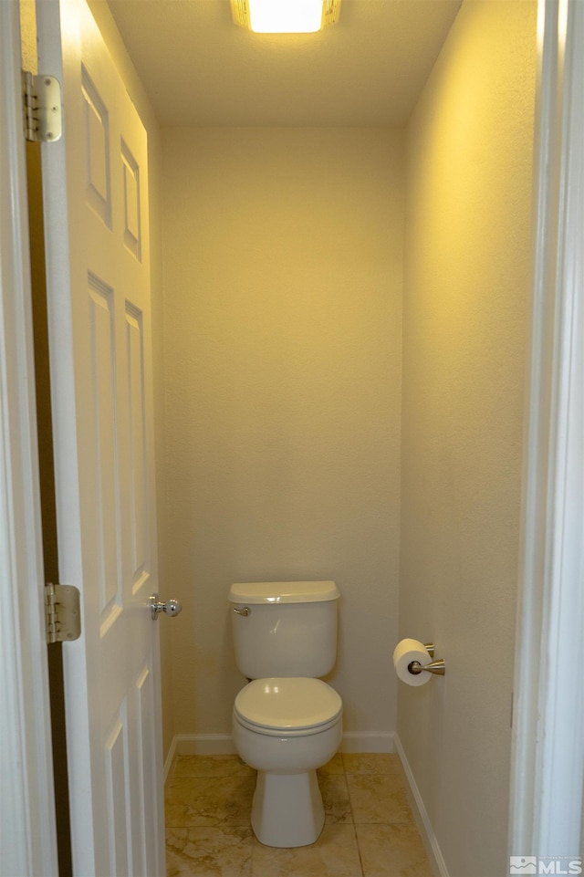 bathroom featuring toilet