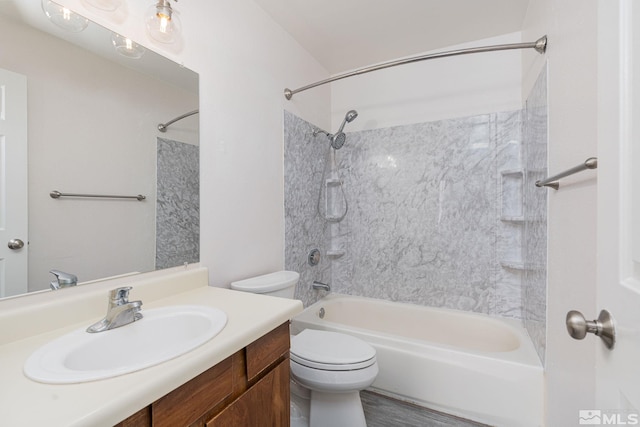 full bathroom featuring vanity, toilet, and shower / bathtub combination