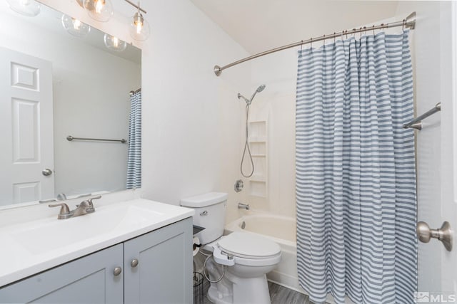 full bathroom with shower / bathtub combination with curtain, vanity, and toilet