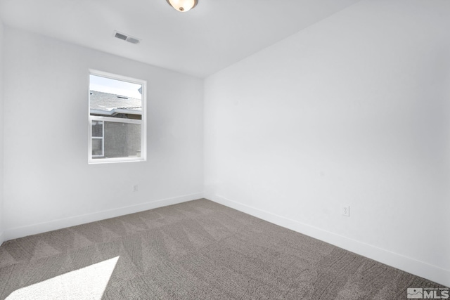 empty room featuring carpet