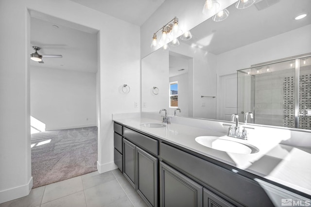 bathroom with vanity, an enclosed shower, tile patterned floors, and ceiling fan