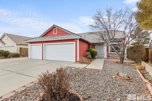 ranch-style house featuring a garage