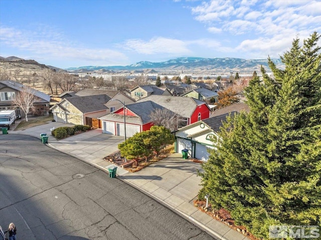 exterior space featuring a mountain view