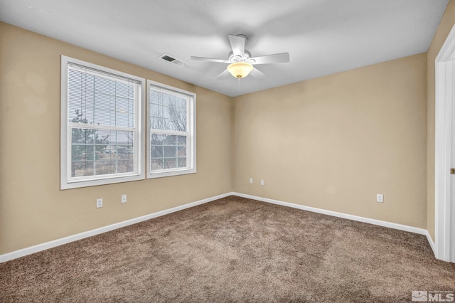 unfurnished room featuring carpet flooring and ceiling fan