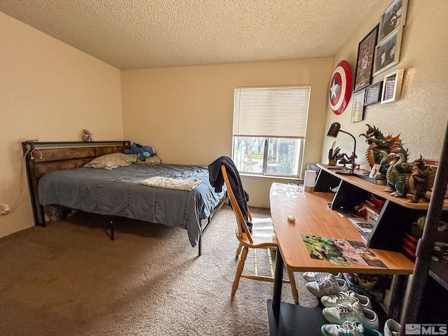 carpeted bedroom with a textured ceiling