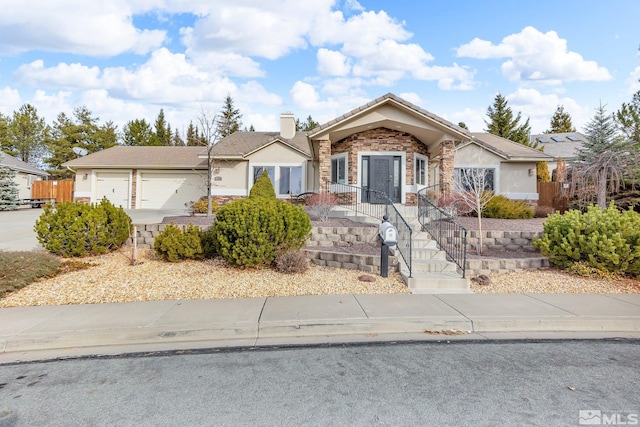 view of front of property featuring a garage