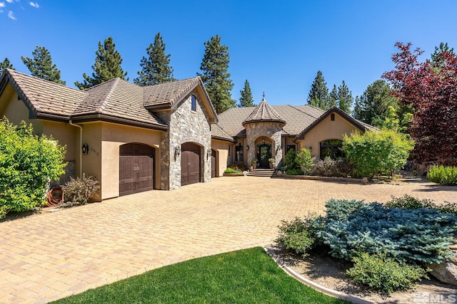 view of front of property with a garage