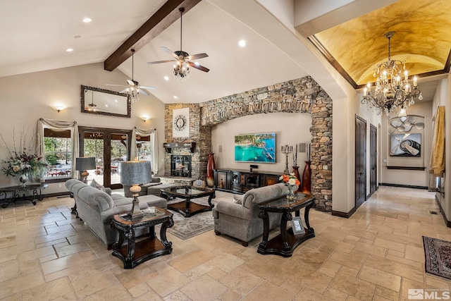 living room with high vaulted ceiling, french doors, ceiling fan with notable chandelier, a stone fireplace, and beamed ceiling