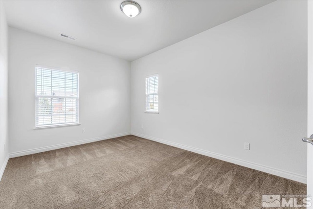 view of carpeted spare room