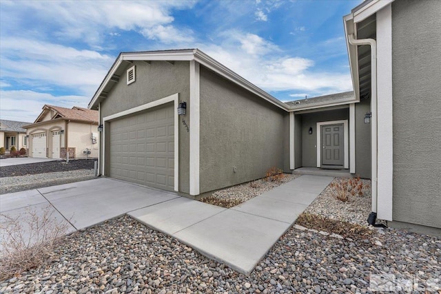 exterior space featuring a garage