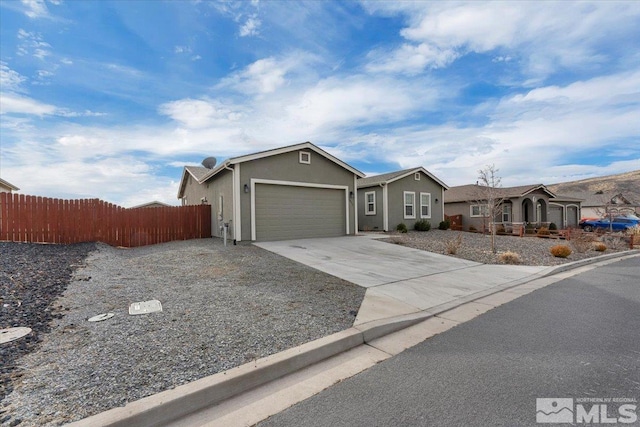 single story home with a garage