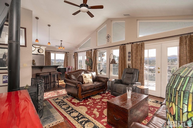 living room with french doors, high vaulted ceiling, and ceiling fan