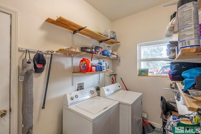 clothes washing area featuring washing machine and dryer