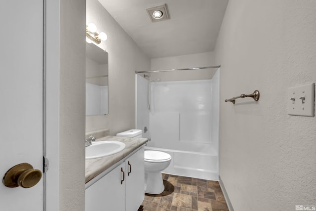 full bathroom with shower / washtub combination, vanity, and toilet