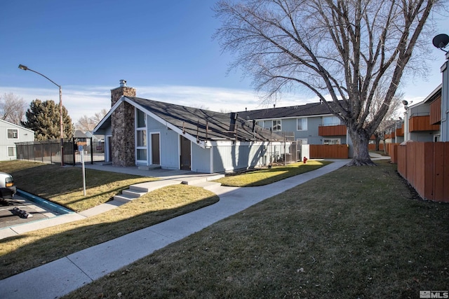 exterior space with a front yard