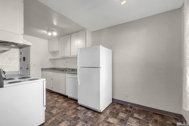 kitchen featuring a textured ceiling, white appliances, white cabinetry, and sink