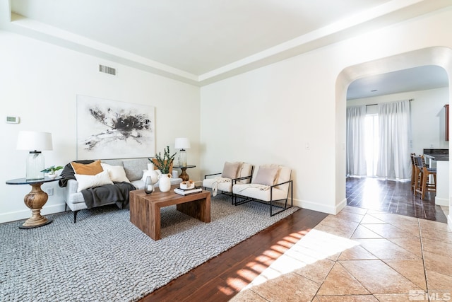 living room with wood-type flooring