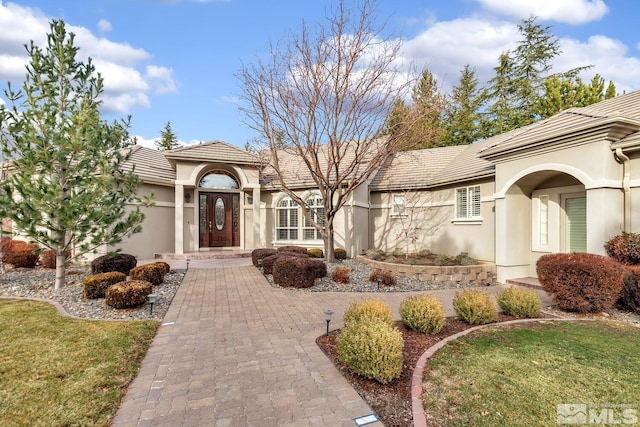 view of front of home with a front lawn