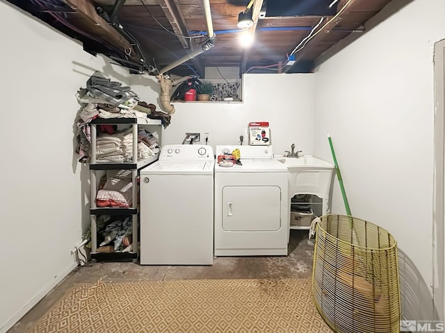 washroom featuring washer and dryer