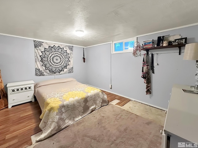 bedroom featuring hardwood / wood-style flooring