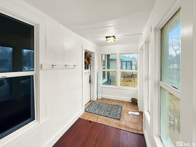 doorway featuring hardwood / wood-style floors