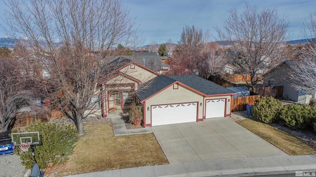 ranch-style house featuring a garage