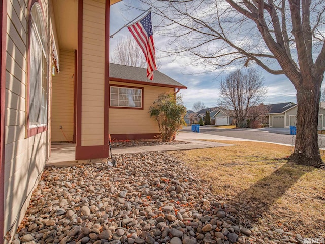 view of yard with a garage