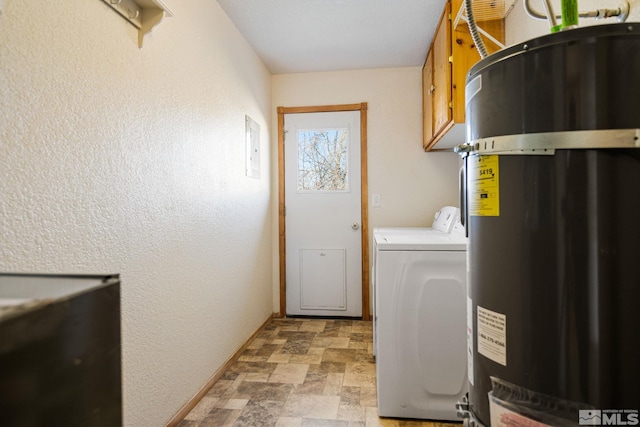 washroom with cabinets and washer and clothes dryer