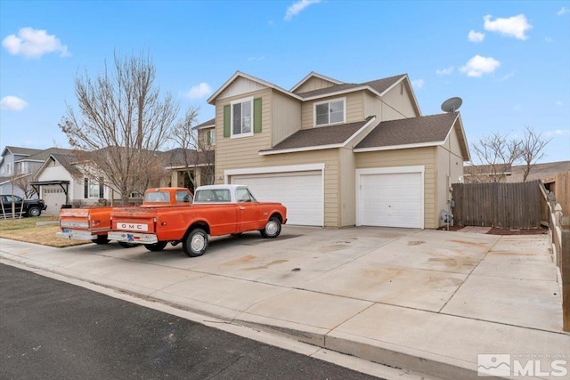 view of front of property with a garage