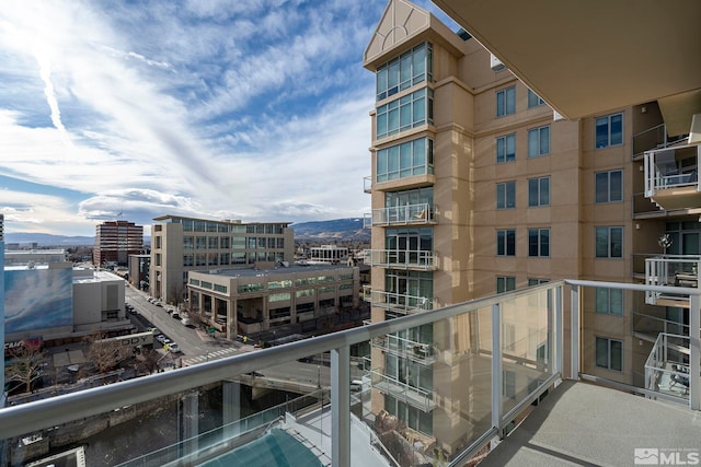 balcony featuring a mountain view